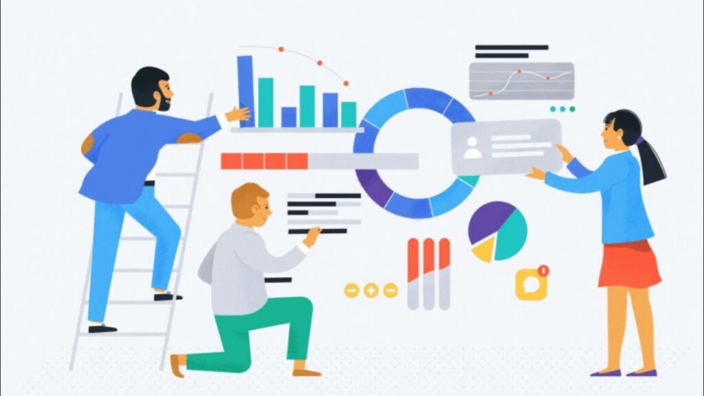 Группа людей работает с графиками и данными